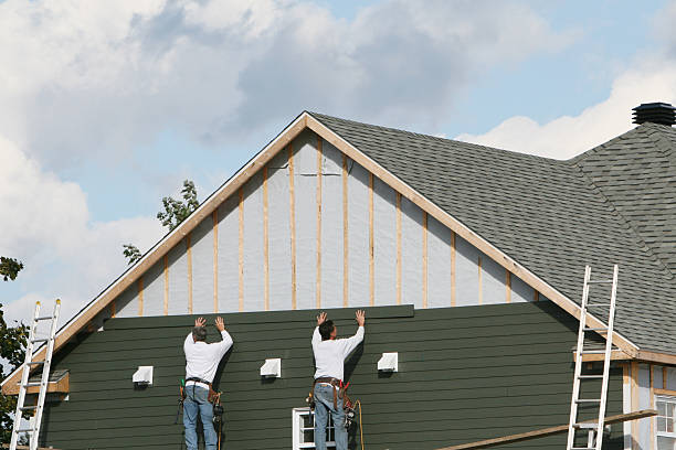 Professional Storm Damage Siding Repair technician working in Rock Hill, NY
